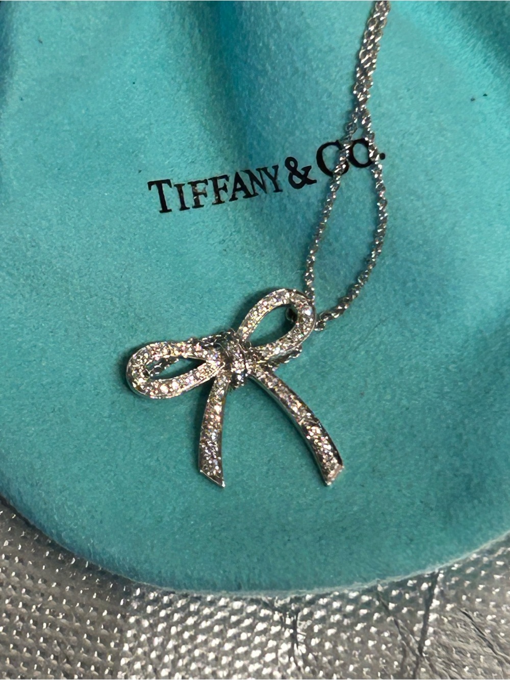 Tiffany & Co. Platinum Bow Pendant Necklace with Sparkling Diamonds